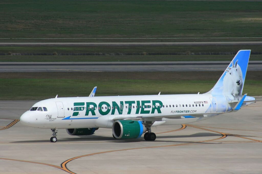 How do I upgrade seat on Frontier Airlines?
